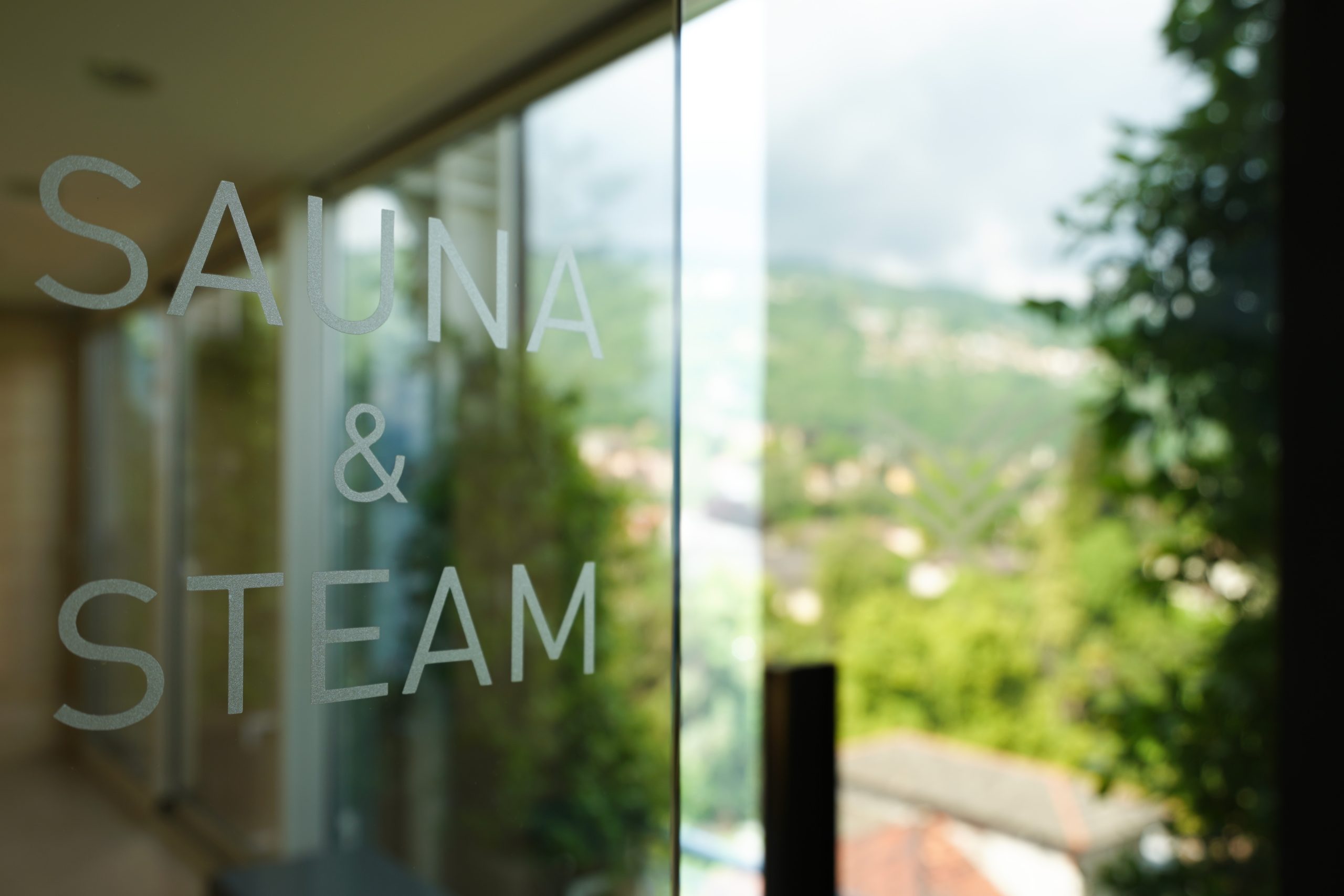 close-up-text-sauna-steam-glass-window